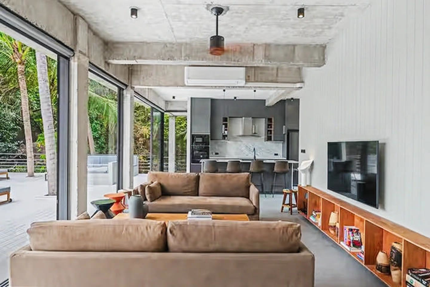 A living room, before and after Keyframe's photo correction
